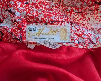 Closeup of a pure silk plum blossom print robe from Shanghai, China
