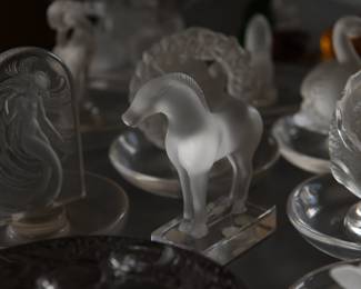A signed Lalique crystal Tang horse paperweight/figurine, a Lalique France leaping koi fish ring dish/trinket tray, a Lalique "Naiade" mermaid ring dish