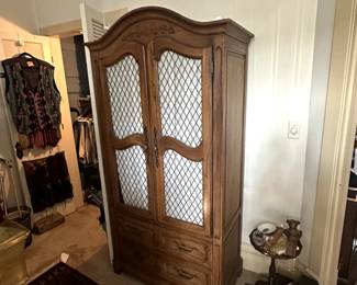 A vintage Hickory Furniture Co French style armoire