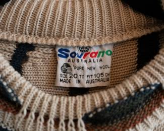 Closeup of vintage men's Sovrano Australia pure wool textured knit sweater, pullover with crew neck, size 20