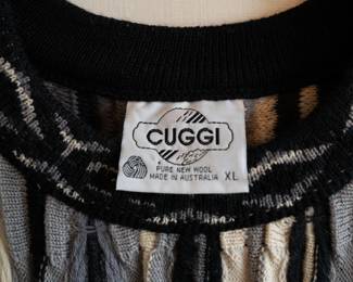 Closeup of a 1980s vintage Cuggi 100% wool 3D knit pullover sweater, size XL, made in Australia