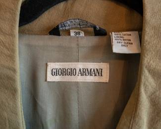 Closeup of vintage classic men's Giorgio Armani trench coat, size 38