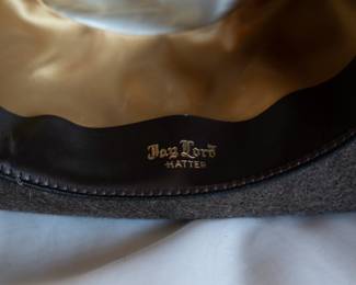 Closeup of the Jay Lord Hatter feather rim fedora hat