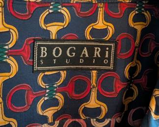 Closeup of Bogari Studio men's long-sleeved silk twill horse tack/bit print shirt