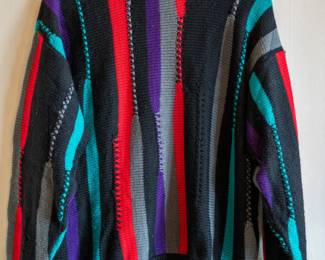 A vintage Coogi Australia 100% wool knit sweater, crew neck, multi-color stripes, size L