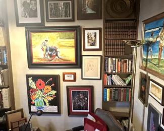 Original artwork, upholstered side chairs, books, floor lamps