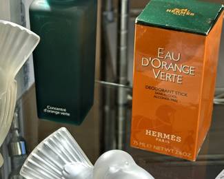 Hermes Paris Eau d'Orange Verte deodorant stick and Eau d'orange verte Eau de cologne, with a Lalique frosted crystal sparrow figurine