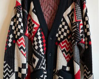 A vintage Coogi 100% wool cardigan knit sweater, size XL