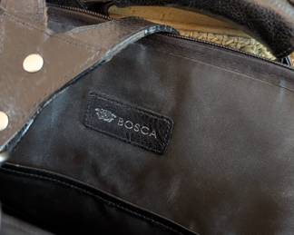 Closeup of Bosca black leather bag backpack