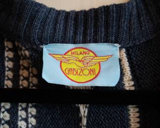 Closeup of vintage Milano Gabizoni men's cardigan sweater, textured knit