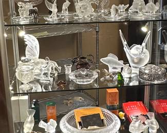Closeup of some of the stunning Lalique Crystal items, an antique Chinese bronze twin dragon handled censor, Louis Vuitton wallet in original box, a Jean Lenoir Le Nez Du Vin wine aroma kit