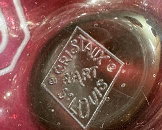 Closeup of mark inside the stunning Art Deco era cranberry to clear cut crystal bowl by St. Louis, the esteemed French makers of fine mouth-blown and hand-cut art glass and crystal since 1586. Acid etched mark reads "Cristaux d'Art St. Louis"