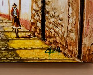 Closeup of signature on pair of signed paintings of Peruvian street scenes