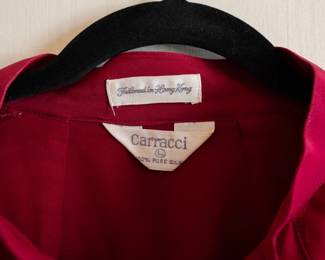 Closeup of vintage men's Carracci scarlet silk jacket, size L, tailored in Hong Kong