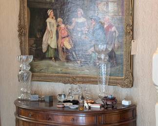 A wonderful old mahogany demilune buffet sideboard cabinet, a fantastic large original antique oil painting of an 18th century scene, signed with initials and the date 1912; two Studio Nova clear glass vases/votive holders; a vintage Licio Zanetti Clear Murano glass horse head sculpture