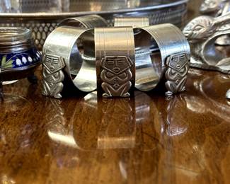 Napkin rings with Aztec/Mayan figures