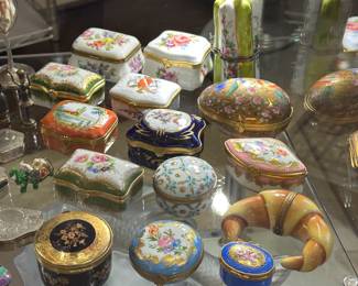 Some of the beautiful Limoges porcelain trinket boxes available at this sale