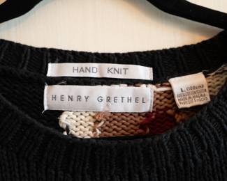 Closeup of a vintage Henry Grethel men's hand knit cotton patterned sweater, size L