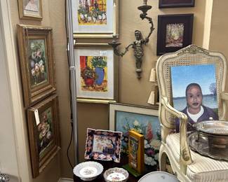 Original art works (more than 100 of them at the sale!) including the first portrait that artist Bruce Bodden painted; vintage porcelain, bronze cherub wall sconce, silver plate serving pieces, occasional tables, cane back chair