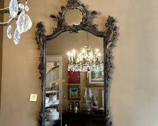 Gorgeous pierce carved polychrome giltwood rococo style mirror, ornately pierce carved with foliate and leaf scrollwork