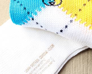 Closeup of Gucci men's argyle socks
