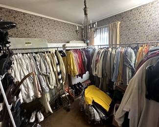 More than 400 pieces of fresh vintage men's clothing — shirts, sweaters, vests, coats, hats, ties, shoes, boots