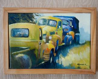 Signed oil on canvas painting of brightly colored vintage trucks