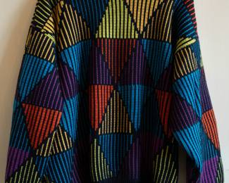 A vintage Coogi Australia 100% wool knit sweater, mock turtleneck, multi-color patterned, size L