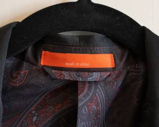 Closeup of Tallia men's suit jacket/blazer, single button closure, lined