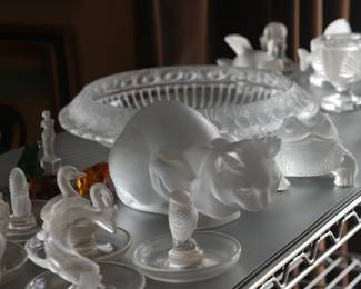 Closer view of the Lalique frosted crystal crouching cat figure, Lalique owl trinket dish/ring holder, Lalique squirrel pin tray/ring holder, impressive large Lalique Marguerites bowl, Lalique "Gregoire" toad/frog, a Lalique France leaping koi fish ring dish/trinket tray