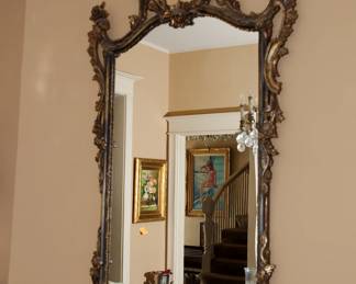 Pierce carved giltwood rococo style mirror, ornately pierce carved with foliate and leaf scrollwork