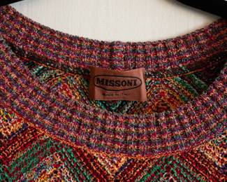 Closeup of Missoni multi-color patterned knitted pullover long sleeve sweater, made in Italy