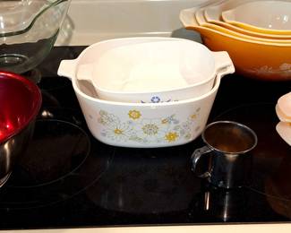 Corning Cinderella nesting bowls, Corning ware casserole dishes, and others.