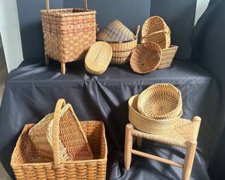Collection Of Woven And Splint Baskets For Decoration And Storage