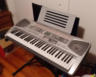 Vintage Casio keyboard on stand