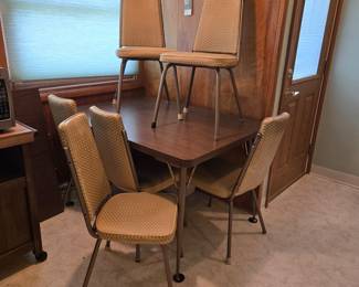 MCM dining table
6 chairs
1 leaf