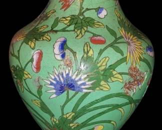 antique Chinese cloisonné vase features a beautiful green floral enamel design, standing at 9 inches tall. Marked with the word "CHINA," this piece dates back to the early 20th century, between 1900-1930.
As is found underneath the house