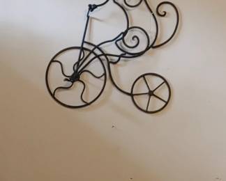 Very large wall wrought Iron wall hanging
... newer Pace but looks like early Mickey Mouse on bicycle