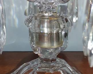 Gorgeous pair of three light candelabra in the Old Williamsburg design by Heisey. This candelabra's consists of 44 individual pieces