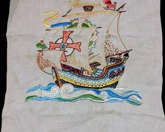 vintage crewel work embroidery featuring a sailing ship with cross & heart on linen