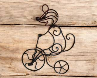 Metal Mouse riding a bicycle about 10 in tall