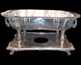 Beautiful silver plate chafing dish. Partially cleaned to show you it will clean up! But there are years of tarnish still left to bring it to its original Beauty