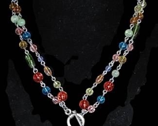 Class faceted beads toggle closure and locket it can be worn short or long