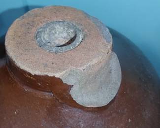 The top has been plugged in with a metal stopper