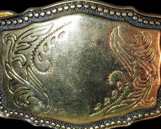 Vintage 2 1/2 x 1 4/5 Inch Southwest Antique Gold Engraved Belt Buckle
Very nice needs a good polishing made in the USA