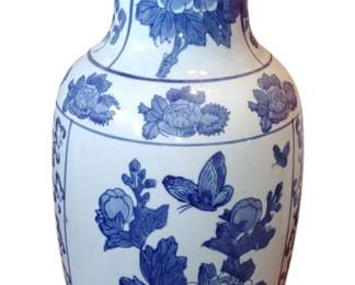 Tall blue and white floral Oriental vase