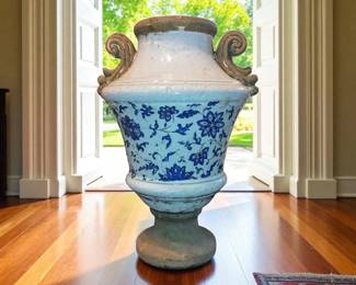 Tall Vintage Double-Handled Floor vase/Garden decor/ Stoneware/Concrete With a blue and white floral glaze. Heavy concrete base. ( the blue floral glaze is perfect on one side but has a slight loss of the design on the other side) natural crazing. Vase does have heavy pads on the bottom -so it won't scrape the floor. However this was used as a garden decor @ one time. It's definitely one of my favorite pieces just found today!