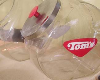 Tom's jar with crack and fracture another Tom's jar with no lid and no decal