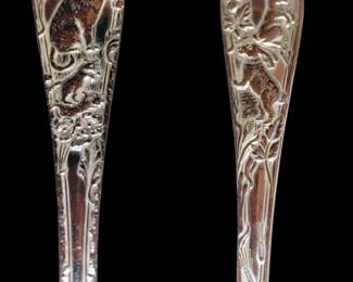 Beautiful red and Barton set of forks one featuring cats and one featuring rabbits