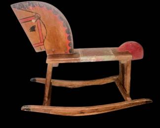 Wonderful antique rocking horse with tacked leather seat